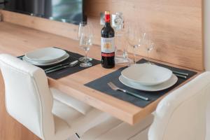 Appartements N-GUEST Suite Deluxe Grenoble : photos des chambres