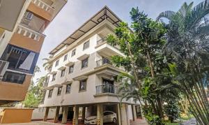 Treebo Aquamarine Arpora With Pool