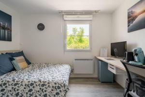 Appartements Studio Tranquille et COSY Fonderie : photos des chambres