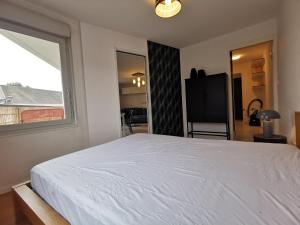Appartements COTE GARE - Gare - Centre-ville - Parking - Netflix - Wifi - Disney+ - Terrasse : photos des chambres