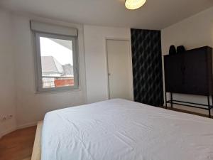 Appartements COTE GARE - Gare - Centre-ville - Parking - Netflix - Wifi - Disney+ - Terrasse : photos des chambres