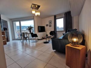 Appartements COTE GARE - Gare - Centre-ville - Parking - Netflix - Wifi - Disney+ - Terrasse : photos des chambres