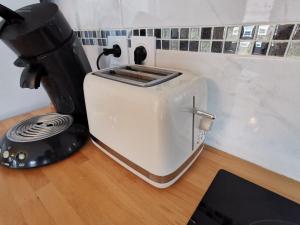 Appartements COTE GARE - Gare - Centre-ville - Parking - Netflix - Wifi - Disney+ - Terrasse : photos des chambres