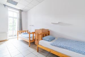 Bed in 4-Bed Dormitory Room room in Hostel Katowice Centrum