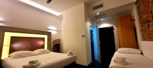 Hotels Kalliste : Chambre Triple (1 Lit Double et 1 Lit Simple)