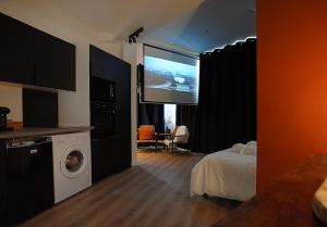 Appartements V' Appart Spa Haussmannien : photos des chambres