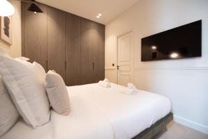 Appart'hotels MBM - Luxury home in marais : photos des chambres