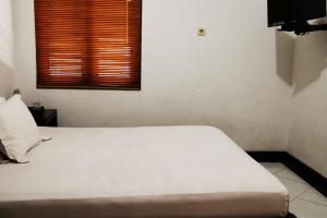 Dinnar Homestay Gayungan Syariah RedPartner