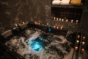 Appartements Superbe Appartement avec Jacuzzi... : photos des chambres