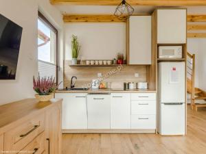 DOMKI RUCHOME PIASKI