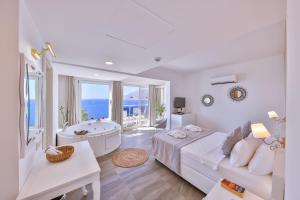 Superior Suite with sea view and Jacuzzi room in La Kumsal Hotel