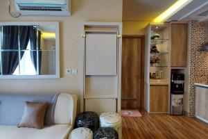 Apt Pejaten Park 1 BR Brown with Netflix, DisneyHot & Swimming Pool