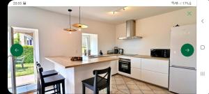 Maisons de vacances La maison du village : photos des chambres