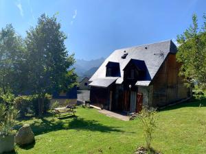 Appartements Appartement dans chalet avec jardin, vue montagne : photos des chambres