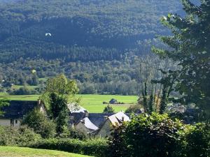 Appartements Appartement dans chalet avec jardin, vue montagne : photos des chambres