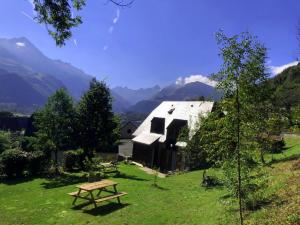 Appartements Appartement dans chalet avec jardin, vue montagne : photos des chambres