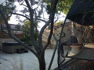 Apartment with private garden, hot tub, WiFi, SAT TV, Klima, near beach 
