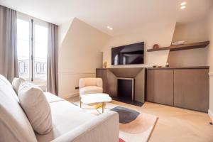 Appart'hotels MBM - Luxury home in marais : photos des chambres