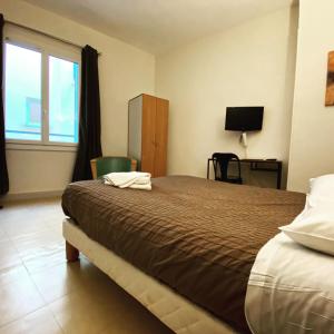 Hotels Hotel Le Midi Clermont-Cournon : photos des chambres