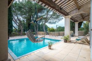 Maisons de vacances Villa tout confort avec piscine privee : photos des chambres