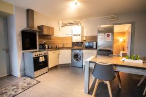 Appartements L'ECLUSE TERRASSE PARKING GRATUIT Home-One : photos des chambres