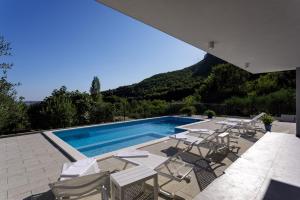 Modern Villa Elia with 40sqm heated pool, 3 bedrooms, and Split city views