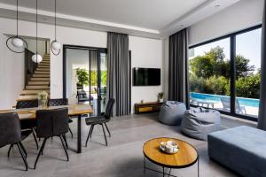 Modern Villa Elia with 40sqm heated pool, 3 bedrooms, and Split city views