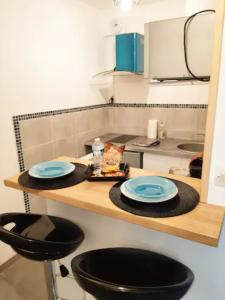 Appartements Le Petit Charmeur, parking, Wifi, gare : photos des chambres