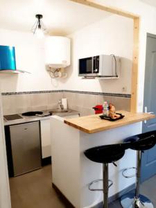 Appartements Le Petit Charmeur, parking, Wifi, gare : photos des chambres