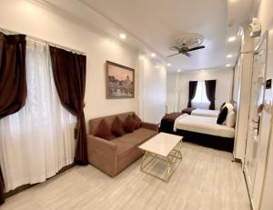 Phòng Deluxe 4 người (Deluxe Quadruple Room)