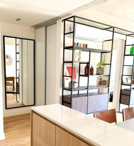 Stylish Apartment by River with Pool & Grill