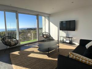 Appartements Superbe appartement avec une vue mer panoramique : photos des chambres