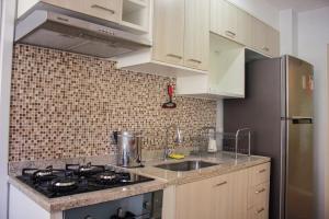 LUXUOSO BEIRA MAR 03 QUARTOS