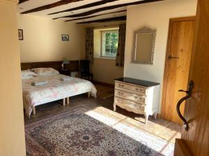 B&B / Chambres d'hotes Longere Ville Voisin - chambre d'hote : photos des chambres