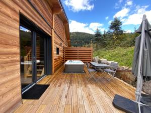 Les Chalets Perce Neige & Jacuzzi privatif, proximite Gerardmer & La Bresse : photos des chambres