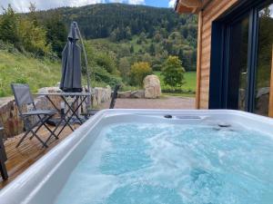 Les Chalets Perce Neige & Jacuzzi privatif, proximite Gerardmer & La Bresse : photos des chambres