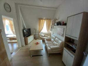 Schwarzer Adler Ferienwohnung mit 3 Schlafzimmer, WZ, Küche, Bad