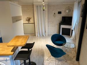 Appartements Le charme du centre YourHostHelper : photos des chambres