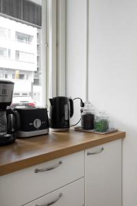 Trendy Nordic Studio by Tram Stop