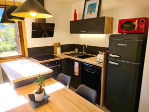 Appartements Appt Tournette - Centre Village, Vue Montagne - AravisTour : photos des chambres