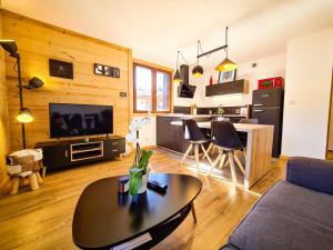 Appartements Appt Tournette - Centre Village, Vue Montagne - AravisTour : photos des chambres