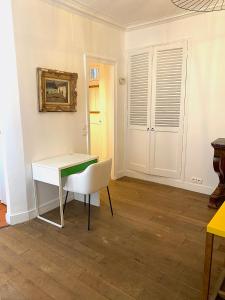 Appartements Real Parisian apartment with 2 bedrooms and AC : photos des chambres