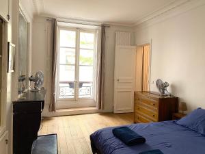 Appartements Real Parisian apartment with 2 bedrooms and AC : photos des chambres