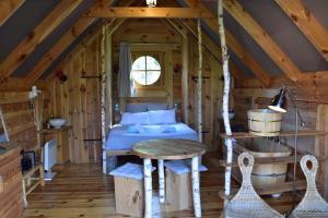 Complexes hoteliers Cabane Lodge Domaine du Lac Chambon : photos des chambres