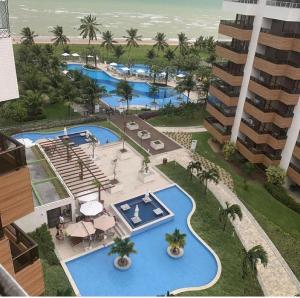 Apartamento a beira-mar com piscina