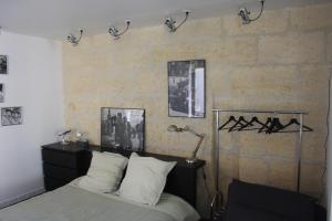 Appartements Le Refuge Des Cordeliers : photos des chambres