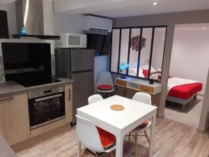 Appartements chez le tit : photos des chambres