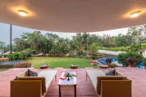 StayVistas Shantam House - Diverelaxation with a pool and tennis lawn