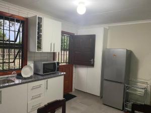 Man and Dog Log Cabin