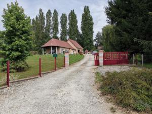 B&B / Chambres d'hotes Au milieu d'un jardin fleuri : photos des chambres